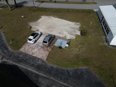 Large vacant lot located in a desirable 55+ manufactured home on Kings Gate Golf Club in Florida - for sale on GolfHomes.com, golf home, golf lot