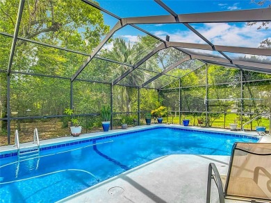 Don't Miss This Well-Priced and Spacious Pool Home with Private on Sugarmill Woods Golf and Country Club in Florida - for sale on GolfHomes.com, golf home, golf lot
