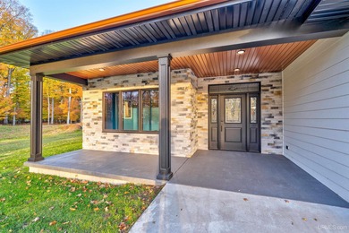 Experience refined modern living in this stunning 2025 on Indian Lake Golf and Country Club in Michigan - for sale on GolfHomes.com, golf home, golf lot