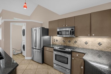 Welcome to this beautifully maintained 2 bedroom, 2 bathroom on Heathrow Country Club in Florida - for sale on GolfHomes.com, golf home, golf lot