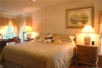 Delightful furnished home featuring wood laminate flooring on Indianwood Golf and Country Club in Florida - for sale on GolfHomes.com, golf home, golf lot