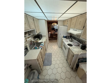 2 bedroom 2 bath condo with lake and golf course view from your on Colony West Country Club in Florida - for sale on GolfHomes.com, golf home, golf lot