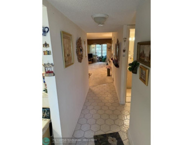 2 bedroom 2 bath condo with lake and golf course view from your on Colony West Country Club in Florida - for sale on GolfHomes.com, golf home, golf lot