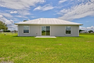 Welcome to this charming, 3-bedroom, 2-bathroom home with modern on Spring Lake Golf Resort in Florida - for sale on GolfHomes.com, golf home, golf lot