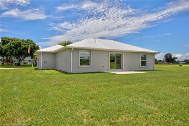 Welcome to this charming, 3-bedroom, 2-bathroom home with modern on Spring Lake Golf Resort in Florida - for sale on GolfHomes.com, golf home, golf lot