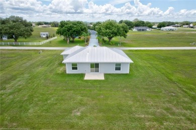 Welcome to this charming, 3-bedroom, 2-bathroom home with modern on Spring Lake Golf Resort in Florida - for sale on GolfHomes.com, golf home, golf lot