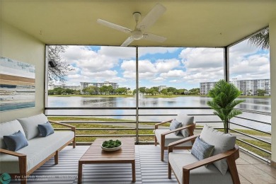 Immediately as you enter the foyer of this BRAND NEW renovated on Palm-Aire Country Club and Resort - Palms in Florida - for sale on GolfHomes.com, golf home, golf lot