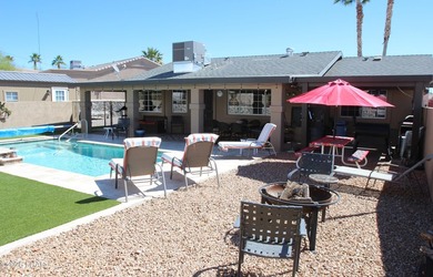 Quiet cul-de-sac location, level driveway, RV parking with full on London Bridge Golf Course in Arizona - for sale on GolfHomes.com, golf home, golf lot