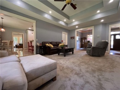 Live in comfort and style on the 16th tee at Lions Den Golf on Lions Den Golf Club in Arkansas - for sale on GolfHomes.com, golf home, golf lot
