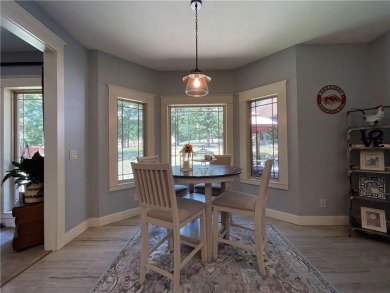 Live in comfort and style on the 16th tee at Lions Den Golf on Lions Den Golf Club in Arkansas - for sale on GolfHomes.com, golf home, golf lot