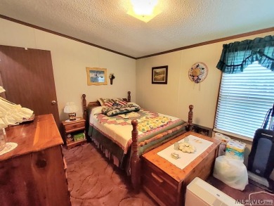 Very spacious and lovingly cared home situated on a Cul-De-Sac on Tanglewood Shores Golf Club in Virginia - for sale on GolfHomes.com, golf home, golf lot