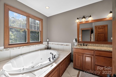 Stunning 4BR/4BA All-Brick Home in Rock Barn Golf & Spa on Rock Barn Golf and Spa in North Carolina - for sale on GolfHomes.com, golf home, golf lot