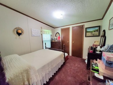 Very spacious and lovingly cared home situated on a Cul-De-Sac on Tanglewood Shores Golf Club in Virginia - for sale on GolfHomes.com, golf home, golf lot