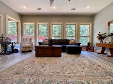 Live in comfort and style on the 16th tee at Lions Den Golf on Lions Den Golf Club in Arkansas - for sale on GolfHomes.com, golf home, golf lot