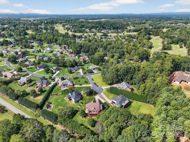 Stunning 4BR/4BA All-Brick Home in Rock Barn Golf & Spa on Rock Barn Golf and Spa in North Carolina - for sale on GolfHomes.com, golf home, golf lot