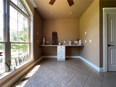 Live in comfort and style on the 16th tee at Lions Den Golf on Lions Den Golf Club in Arkansas - for sale on GolfHomes.com, golf home, golf lot