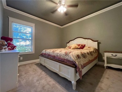 Live in comfort and style on the 16th tee at Lions Den Golf on Lions Den Golf Club in Arkansas - for sale on GolfHomes.com, golf home, golf lot