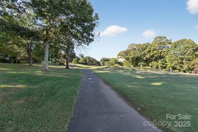 Stunning 4BR/4BA All-Brick Home in Rock Barn Golf & Spa on Rock Barn Golf and Spa in North Carolina - for sale on GolfHomes.com, golf home, golf lot