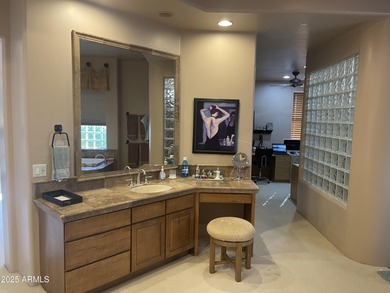 This exceptional turnkey residence is situated in Pinnacle on  in Arizona - for sale on GolfHomes.com, golf home, golf lot