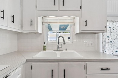 Cozy Beach-Cottage Vibes in Fairway Village -- Where the Living on Fairway Village Golf Course in Florida - for sale on GolfHomes.com, golf home, golf lot