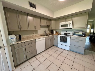 Welcome to this meticulously maintained 2 bed, 2 bath oasis on On Top Of The World Golf Course in Florida - for sale on GolfHomes.com, golf home, golf lot