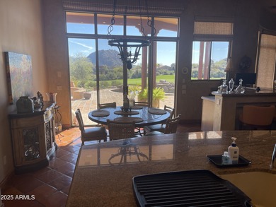 This exceptional turnkey residence is situated in Pinnacle on  in Arizona - for sale on GolfHomes.com, golf home, golf lot