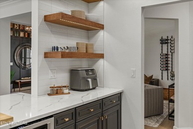 Discover a beautifully curated blend of timeless traditional on Tanasi Golf Course in Tennessee - for sale on GolfHomes.com, golf home, golf lot