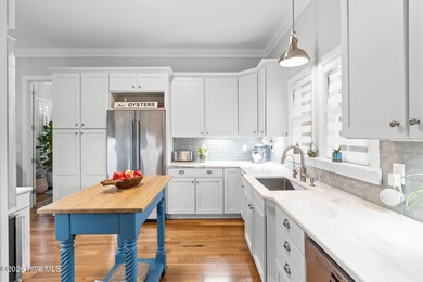 Elegant Charleston-style custom home located in an amenity-rich on Lockwood Folly Country Club in North Carolina - for sale on GolfHomes.com, golf home, golf lot