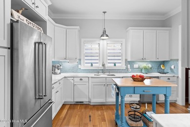 Elegant Charleston-style custom home located in an amenity-rich on Lockwood Folly Country Club in North Carolina - for sale on GolfHomes.com, golf home, golf lot