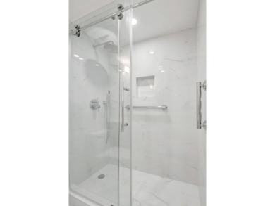 Fully renovated 1BR/1.5BA villa in the quiet Valencia section of on Kings Point Golf -Flanders Way in Florida - for sale on GolfHomes.com, golf home, golf lot
