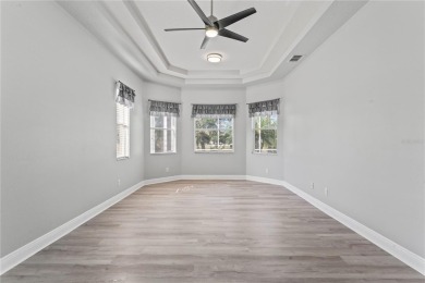 Welcome to this lovingly maintained home, located in the gated on Heritage Isles Golf and Country Club in Florida - for sale on GolfHomes.com, golf home, golf lot