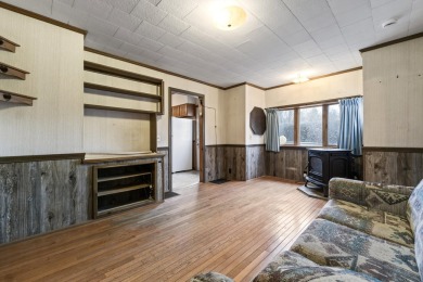 This charming single-family home, built in 1900, offers 3 on J.W. Parks Golf Course in Maine - for sale on GolfHomes.com, golf home, golf lot