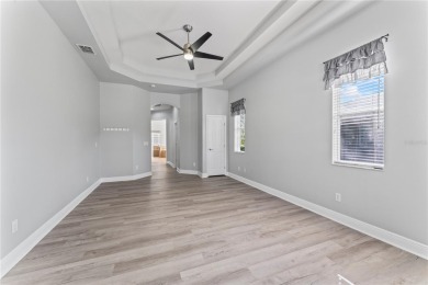 Welcome to this lovingly maintained home, located in the gated on Heritage Isles Golf and Country Club in Florida - for sale on GolfHomes.com, golf home, golf lot