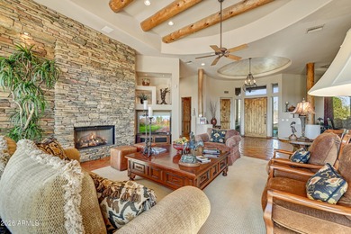 Here is an exceptional turnkey home located in Pinnacle Canyon a on Troon North Golf Club  in Arizona - for sale on GolfHomes.com, golf home, golf lot