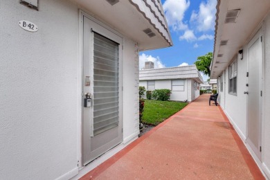 Fully renovated 1BR/1.5BA villa in the quiet Valencia section of on Kings Point Golf -Flanders Way in Florida - for sale on GolfHomes.com, golf home, golf lot