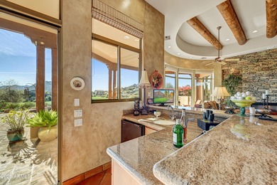 Here is an exceptional turnkey home located in Pinnacle Canyon a on Troon North Golf Club  in Arizona - for sale on GolfHomes.com, golf home, golf lot