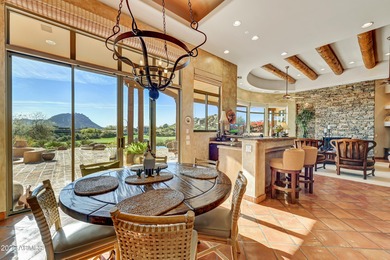 Here is an exceptional turnkey home located in Pinnacle Canyon a on Troon North Golf Club  in Arizona - for sale on GolfHomes.com, golf home, golf lot