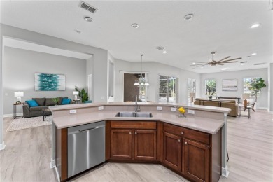 Welcome to this lovingly maintained home, located in the gated on Heritage Isles Golf and Country Club in Florida - for sale on GolfHomes.com, golf home, golf lot