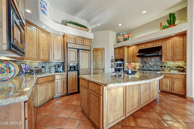 Here is an exceptional turnkey home located in Pinnacle Canyon a on Troon North Golf Club  in Arizona - for sale on GolfHomes.com, golf home, golf lot