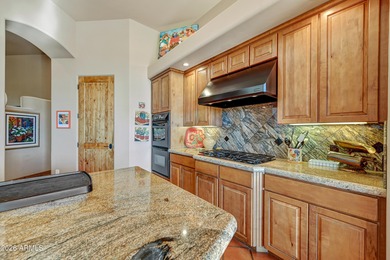 Here is an exceptional turnkey home located in Pinnacle Canyon a on Troon North Golf Club  in Arizona - for sale on GolfHomes.com, golf home, golf lot