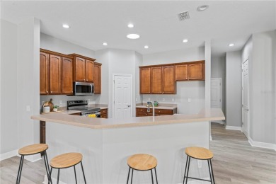 Welcome to this lovingly maintained home, located in the gated on Heritage Isles Golf and Country Club in Florida - for sale on GolfHomes.com, golf home, golf lot