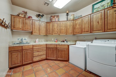 Here is an exceptional turnkey home located in Pinnacle Canyon a on Troon North Golf Club  in Arizona - for sale on GolfHomes.com, golf home, golf lot