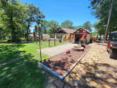 Discover modern luxury in this fully remodeled home in the on Indian Hills Country Club in Arkansas - for sale on GolfHomes.com, golf home, golf lot