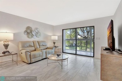 Move right into this tropical paradise of Wynmoor Village! Fully on Wynmoor Golf Course in Florida - for sale on GolfHomes.com, golf home, golf lot