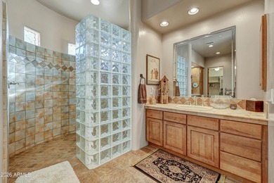 Here is an exceptional turnkey home located in Pinnacle Canyon a on Troon North Golf Club  in Arizona - for sale on GolfHomes.com, golf home, golf lot