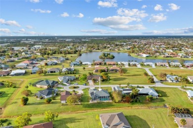 METICULOUSLY MAINTAINED 3 BEDROOM, 2 BATH, 2-CAR GARAGE POOL on Deep Creek Golf Club in Florida - for sale on GolfHomes.com, golf home, golf lot