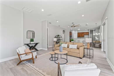 Welcome to this lovingly maintained home, located in the gated on Heritage Isles Golf and Country Club in Florida - for sale on GolfHomes.com, golf home, golf lot
