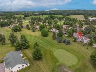 Experience living at its finest with this impeccable 2 bed, 2.5 on Saddle Ridge Golf Club in Wisconsin - for sale on GolfHomes.com, golf home, golf lot