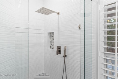 Elegant Charleston-style custom home located in an amenity-rich on Lockwood Folly Country Club in North Carolina - for sale on GolfHomes.com, golf home, golf lot