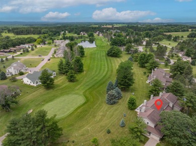 Experience living at its finest with this impeccable 2 bed, 2.5 on Saddle Ridge Golf Club in Wisconsin - for sale on GolfHomes.com, golf home, golf lot